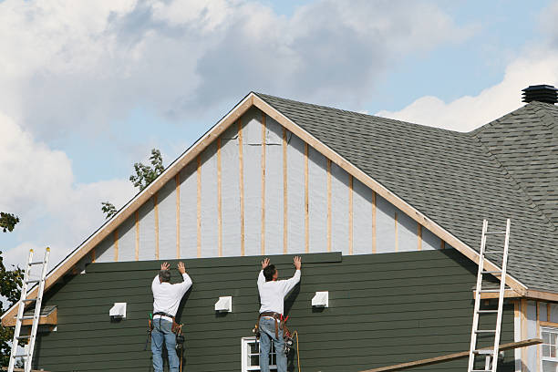 Professional Siding Contractor technician working in Hempstead, TX